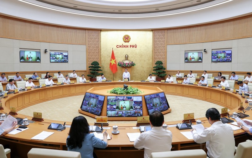 Thủ tướng Phạm Minh Chính chủ trì phiên họp Chính phủ thường kỳ tháng 7/2022, kết nối trực tuyến tới các địa phương. Ảnh VGP
