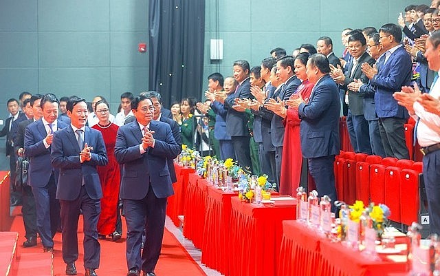 Thủ tướng Chính phủ Phạm Minh Chính cùng các đồng chí lãnh đạo Đảng, Nhà nước đến dự lễ kỷ niệm ngày Doanh nhân Việt Nam - Ảnh: VGP/Nhật Bắc