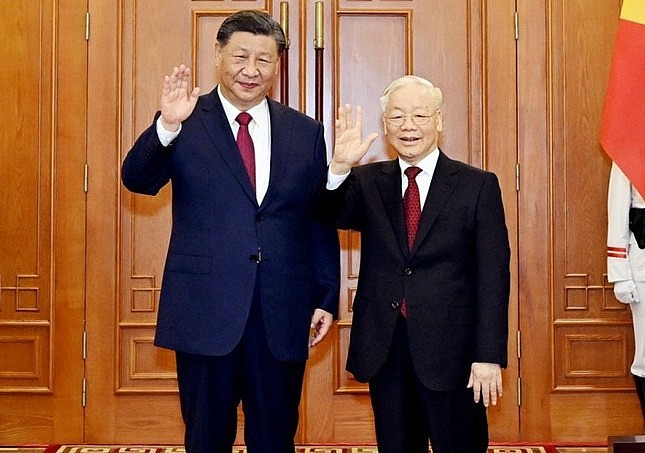 Tổng Bí thư Nguyễn Phú Trọng và Tổng Bí thư, Chủ tịch Trung Quốc Tập Cận Bình chụp ảnh chung trước hội đàm. (Ảnh: Như Ý)