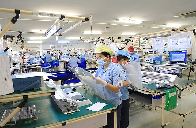 Lao động làm việc trong các doanh nghiệp công nghiệp ở Hà Nội. Ảnh: VGP