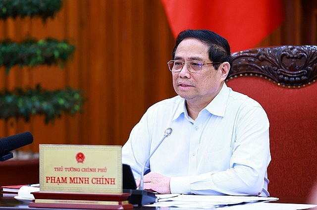 Thủ tướng Phạm Minh Chính: Không để thiếu điện cho sản xuất, kinh doanh, tiêu dùng trong bất kỳ hoàn cảnh nào - Ảnh: VGP