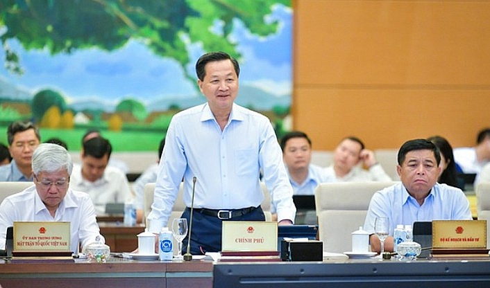 Phó Thủ tướng Lê Minh Khái phát biểu giải trình. 