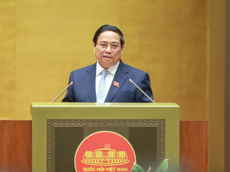 Thủ tướng Phạm Minh Chính trình bày Báo cáo tại Kỳ họp thứ 9, Quốc hội khóa XV - Ảnh: VGP