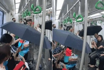 Giải thích từ Hà Nội Metro về việc khách phải dùng ô trên tàu
