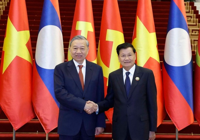 Tổng Bí thư Tô Lâm và Tổng Bí thư, Chủ tịch nước Lào Thongloun Sisoulith đồng chủ trì Cuộc gặp cấp cao giữa Đảng Cộng sản Việt Nam và Đảng Nhân dân Cách mạng Lào. Ảnh: TTXVN Tổng Bí thư Tô Lâm và Tổng Bí thư, Chủ tịch nước Lào Thongloun Sisoulith đồng chủ trì Cuộc gặp cấp cao giữa Đảng Cộng sản Việt Nam và Đảng Nhân dân Cách mạng Lào. Ảnh: TTXVN