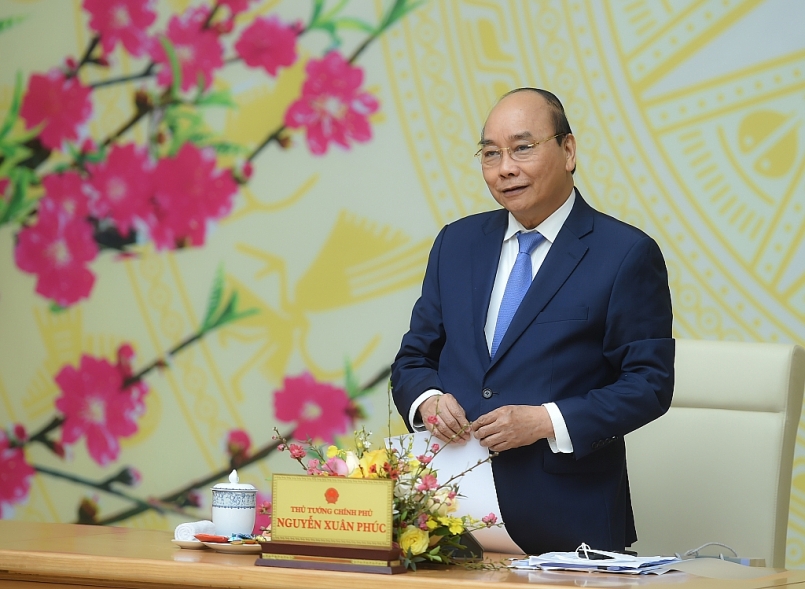 Thủ tướng Nguyễn Xuân Phúc phát biểu tại cuộc họp triển khai nhiệm vụ trọng tâm năm 2021 của Văn phòng Chính phủ. Ảnh: VGP/Quang Hiếu