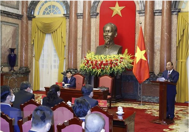 Chủ tịch nước Nguyễn Xuân Phúc phát biểu tại buổi gặp mặt.(Ảnh: Thống Nhất/TTXVN)