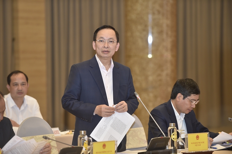 Phó Thống đốc NHNN Đào Minh Tú trả lời các câu hỏi của phóng viên. Ảnh: VGP/Nhật Bắc