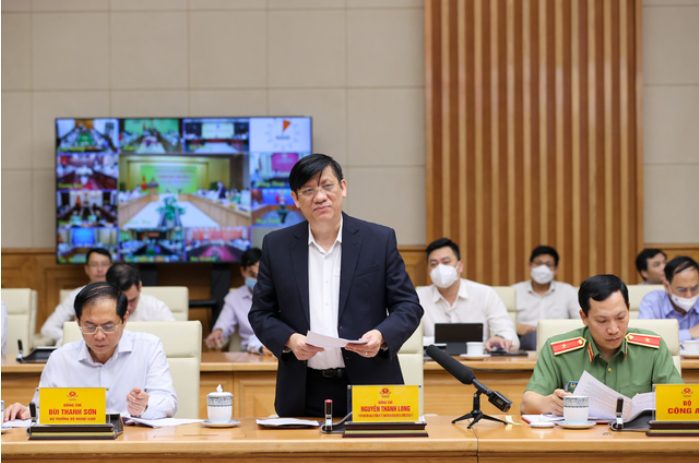 Bộ trưởng Bộ Y tế Nguyễn Thanh Long báo cáo tại phiên họp - Ảnh: VGP/Nhật Bắc