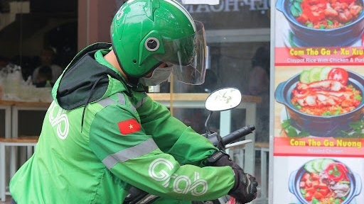Grab và Now thông báo dừng chở khách, giao đồ ăn tại Hà Nội