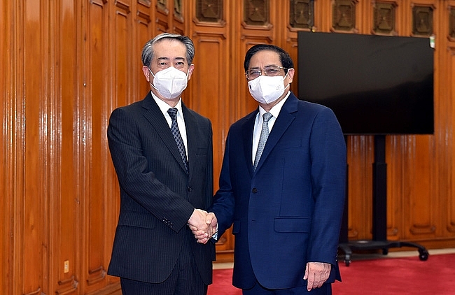 Thủ tướng Chính phủ Phạm Minh Chính và Đại sứ Trung Quốc tại Việt Nam Hùng Ba. (Ảnh: VGP)