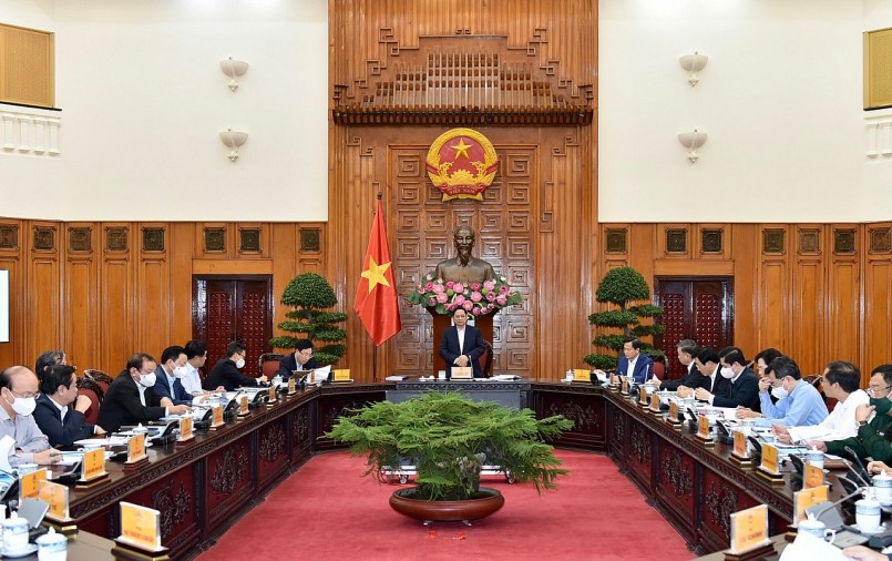 Thủ tướng Phạm Minh Chính chủ trì cuộc họp của Thường trực Chính phủ cho ý kiến về dự thảo Chương trình phục hồi và phát triển kinh tế - xã hội. Ảnh VGP/Nhật Bắc